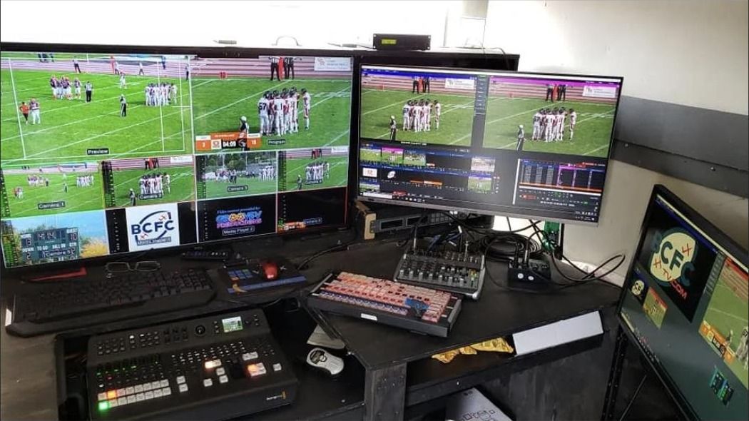 Multiview monitors and switcher at a football broadcast produced by Groove-V